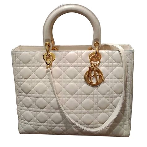 lady dior whit syrap|Lady Dior handbags.